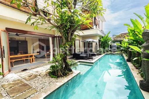 Impressive Six-Bedroom Residence in Seminyak Blending Enclosed Comfort with Open Tropical Elegance