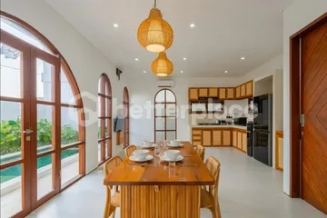 Refined Yearly Rental Opportunity: Furnished 2BR Villa with Pool and Enclosed Living in Tranquil Canggu Setting