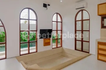 Refined Yearly Rental Opportunity: Furnished 2BR Villa with Pool and Enclosed Living in Tranquil Canggu Setting