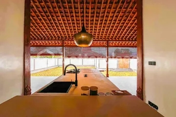 Yearly Rental 2-Bed Villa Offering Timeless Wooden Joglo Architecture, Open Living Concept, and Serene Tropical Ambience in South Bali