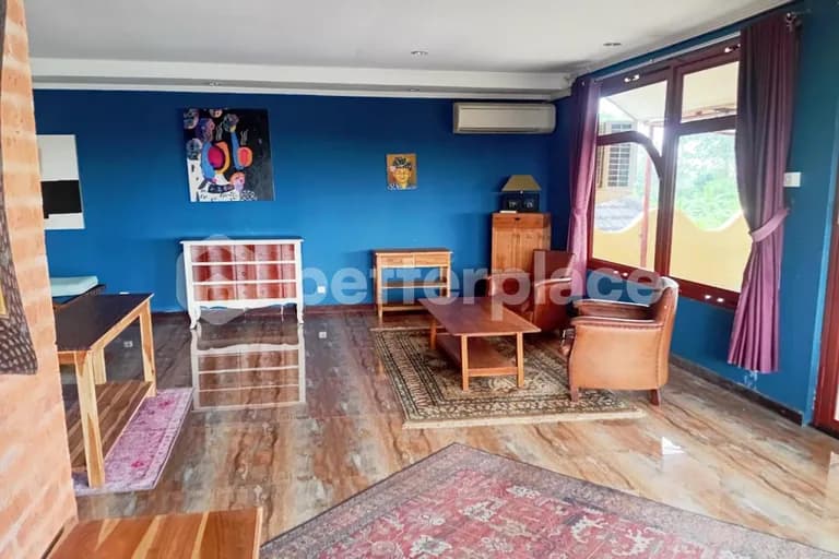 Experience Authentic Balinese Living in a Hand-Carved Wooden 1-Bed Apartment with Large Terrace in Saba