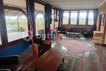 Experience Authentic Balinese Living in a Hand-Carved Wooden 1-Bed Apartment with Large Terrace in Saba