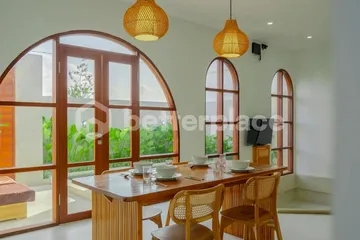 Refined Yearly Rental Opportunity: Furnished 2BR Villa with Pool and Enclosed Living in Tranquil Canggu Setting