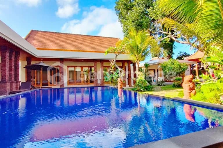 Tropical Opulence: 10-Bedroom Yearly Retreat Villa with Rice Field Views