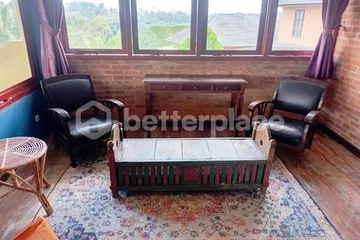 Experience Authentic Balinese Living in a Hand-Carved Wooden 1-Bed Apartment with Large Terrace in Saba