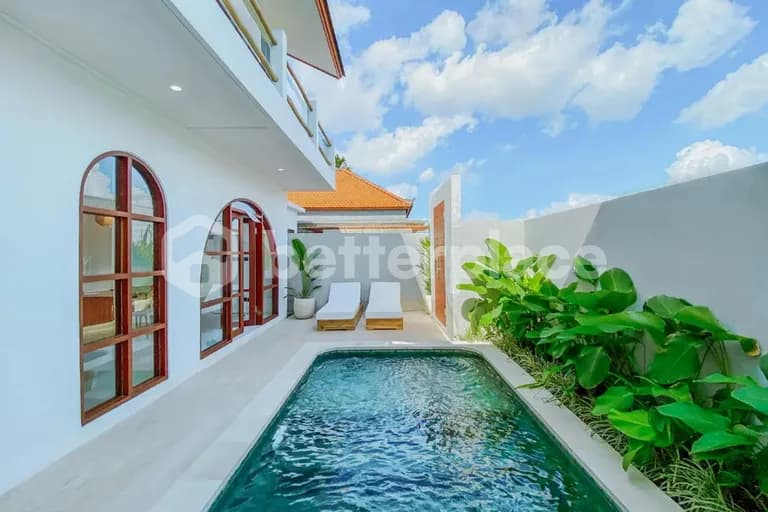 Refined Yearly Rental Opportunity: Furnished 2BR Villa with Pool and Enclosed Living in Tranquil Canggu Setting