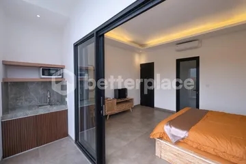 Elegant Coastal Living Opportunity – Sophisticated 2-Bedroom Furnished Apartment with Rooftop Ocean Views Just Moments from Cemagi Beach