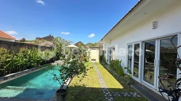 Chic Tropical Contemporary Villa in Tranquil Buwit – 3 Bedrooms with Sunset Views