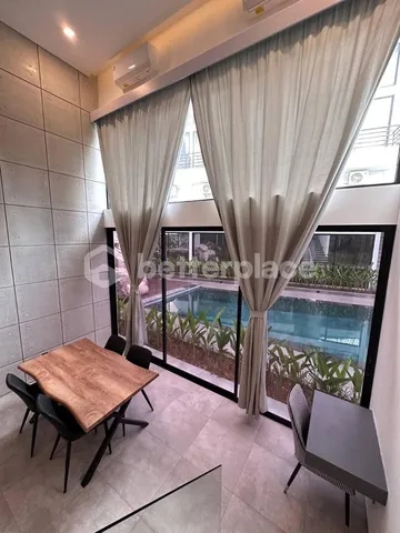 Modern Two Storey Apartment in Canggu, A Prime Investment for Living and Business