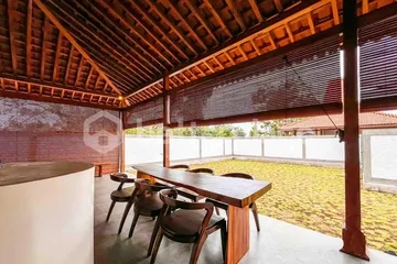 Yearly Rental 2-Bed Villa Offering Timeless Wooden Joglo Architecture, Open Living Concept, and Serene Tropical Ambience in South Bali