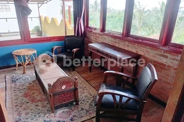 Experience Authentic Balinese Living in a Hand-Carved Wooden 1-Bed Apartment with Large Terrace in Saba